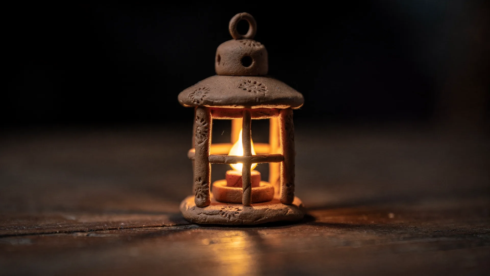 Social Reform emblem: a glowing terrace lamp